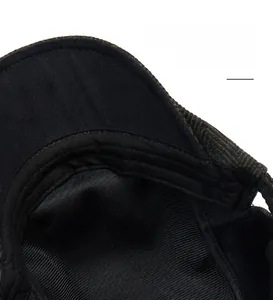 Close-up of the breathable inner sweatband and stitching on a wool newsboy cap