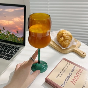Amber and green contrast stem glass with heat-resistant glass for milk and juice
