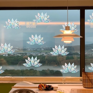 Detailed view of rainbow prism lotus window stickers with holographic reflective effect