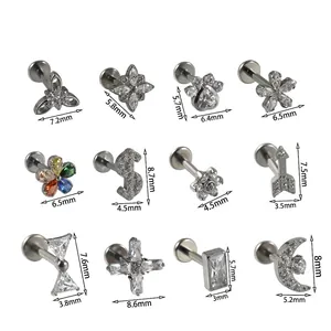 Solid G23 titanium labret studs size chart featuring flower, cross, and moon shapes