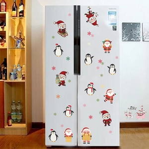 Christmas Santa and penguin stickers on white fridge with Merry Christmas wall decal