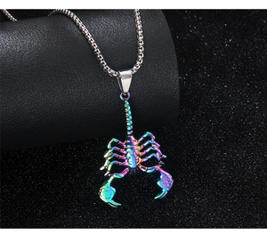 Macro shot of 3D rainbow scorpion pendant with vibrant holographic finish on box chain