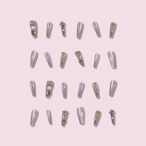 24 faux ongles coffin fait main effet œil de chat lavande avec détails dorés et strass