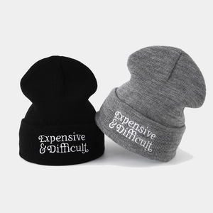 Knitted beanie set in black and grey featuring white Expensive & Difficult embroidery