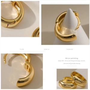 Macro detail of 18K gold plated hoop earrings showing 360 degree mirror polish and 925 stamp