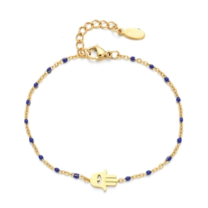 Detail view of golden Hamsa Hand bracelet with blue beads and lobster clasp closure