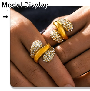 Detailed view of layered 18K gold plated titanium ring with pavé-set cubic zirconia on hand
