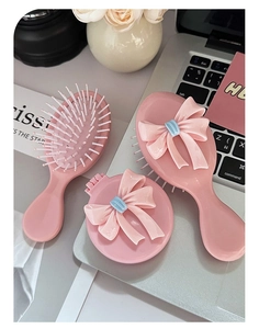 Rosa Schleifen-Massagebürsten-Set mit tragbarem Spiegel und niedlichem Haarkamm-Zubehör