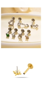Macro view of titanium flat back labret studs with zircon heart and star shapes