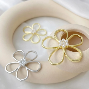 Hollow flower jewelry pendants with imitation pearls in gold and silver metal finishes