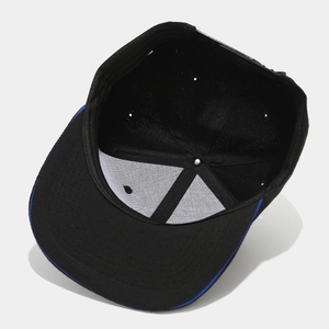 Classic black hip-hop snapback hat showing interior structure with blue brim accent detail