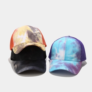 Three tie-dye trucker hats with breathable mesh back and adjustable strap for women