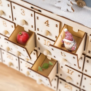 Wooden 24-day Christmas advent calendar with small drawers and festive snowflake decor