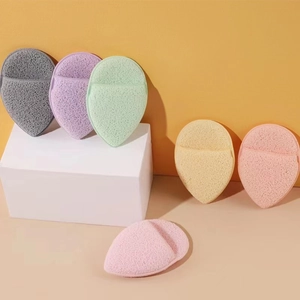 Macro shot of colorful teardrop sponges in grey, pink, purple, green, and yellow