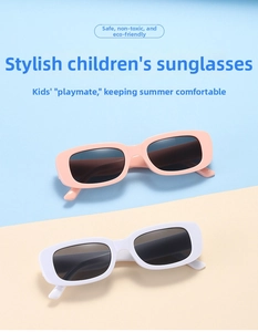 Detail view of two pairs of rectangle kids sunglasses in pink and white frames
