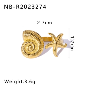 Detailed view of 18K gold starfish and seashell ring with size and weight measurements