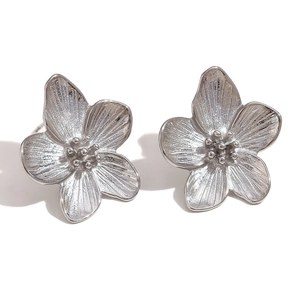 Silver flower stud earrings with brushed metal texture and 3D floral design