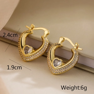 Detailed size view of gold-plated heart earrings with sparkling cubic zirconia stones