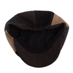 Classic patchwork wool newsboy cap with warm brown and grey textured fabric panels