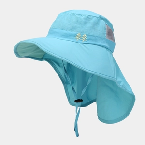 Close-up of blue sun hat featuring neck protection, breathable mesh, and pine tree embroidery