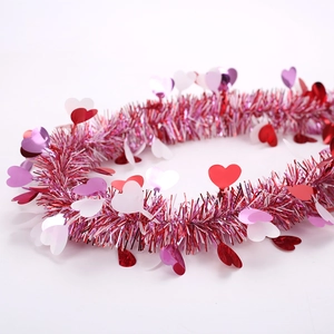 Pink and red Valentine tinsel garland with heart sequins for party atmosphere decor