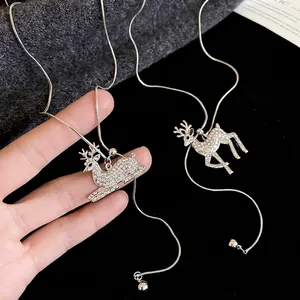 Sparkling silver deer pendant necklace with rhinestone paving on a fine snake chain