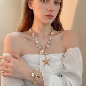 Seaside beach pearl necklace and bracelet set with golden starfish shell charms