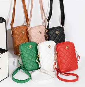 Detailed row of quilted mobile phone bags featuring golden rose metal buckles and thin straps