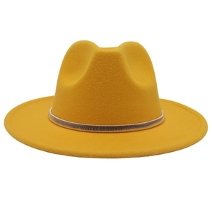 Close-up of bright yellow wool fedora hat featuring a stylish narrow metal band detail
