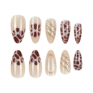 3D gold leopard print almond-shaped press-on nails set with metallic relief details