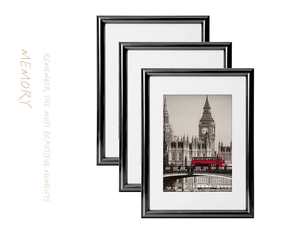Three-piece set of modern black frames with white mat and London landmark photo prints