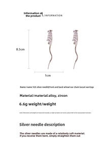 Detailed view showing 8.5cm length and weight of gold wheat earrings with silver needle