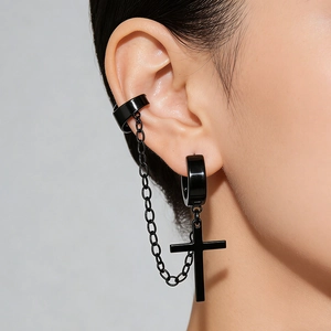 Macro side view of black stainless steel cross earring set with chain link on model