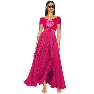 Fuchsia cut-out swimsuit set featuring 3D rose decoration and layered ruffle skirt