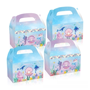 Detail of mermaid and shell themed party gift boxes with blue-purple dreamlike gradient