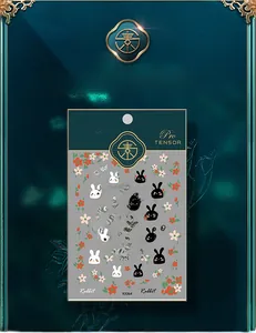 Detail of KX064 5D nail sticker featuring cute black and white rabbits and floral patterns