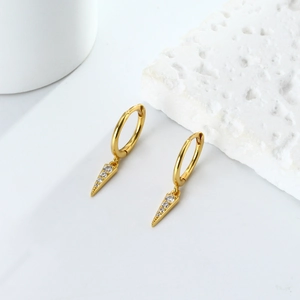 Detailed close-up of S925 silver hoop earrings with gold plated triangular zircon spikes