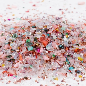 Macro shot of 2-8mm irregular mixed colorful glass crushed stones for DIY handicrafts