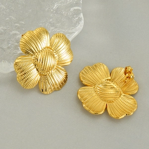 Golden sunflower earrings in stainless steel with textured petals and relief centers