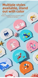 Flat lay of colorful silicone swim caps featuring various cute cartoon animal patterns