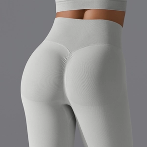 Detail of high waist seamless yoga pants featuring scrunch butt lifting texture in grey