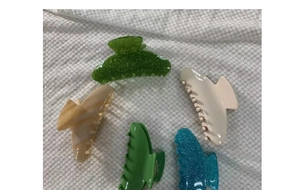 Set of 5 large hair claw clips in assorted glitter green, marble, and solid colors