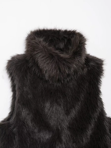 Detailed view of the dark brown faux fur vest featuring a stylish high neck collar design