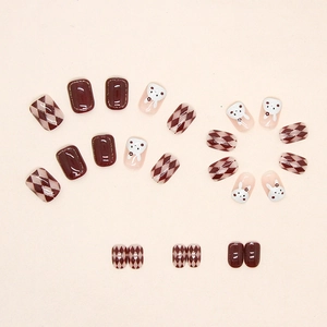 Caramel reddish-brown press-on nails with argyle patterns and cute bunny designs