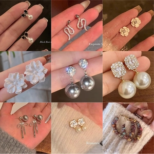 Collection of elegant 925 silver needle pearl earrings with bows and floral designs