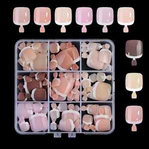 French tip press-on nails set in nude pink colors displayed in a clear storage box