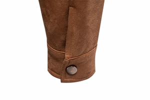 Detail of brown suede sleeve cuff with a metal button engraved with CLASSIC text