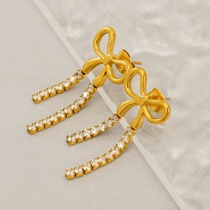 Elegant gold bowknot tassel earrings with cubic zirconia fringes for a luxury look