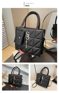 Detail of black crossbody bag with large diamond stitching and mini hanging pouch charm