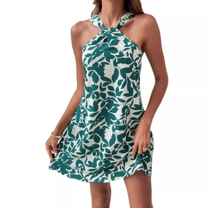Green and white leaf print halter neck mini dress with backless ruffle design for summer